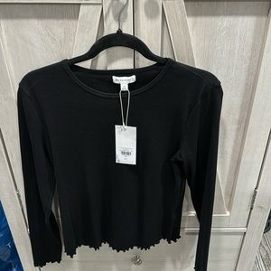 Warehouse brand Black lettuce trim top Size 12